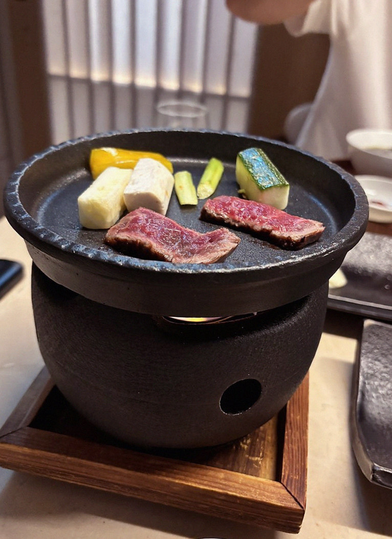 WOOARA Gwanghwamun · the signature Hanwoo showing — marbled beef cuts and caviar presented in a display chest