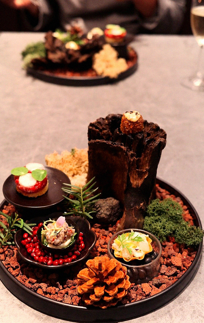 WOOHANA Yeouido · the signature Hanwoo showing — marbled beef cuts and caviar presented in a display chest