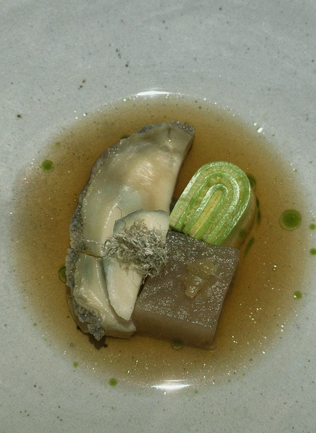 WOOARA Gwanghwamun · seafood course served alongside the beef