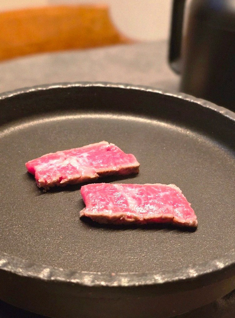 GOWOOGA Yeouido · premium marbled Hanwoo beef presented before grilling