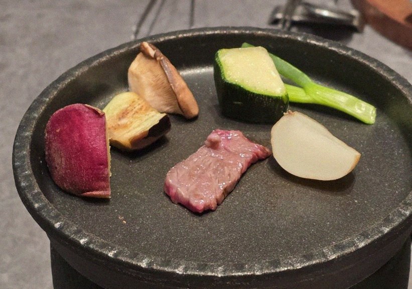 WOOHANA Yeouido · Hanwoo beef grilling over binchotan charcoal