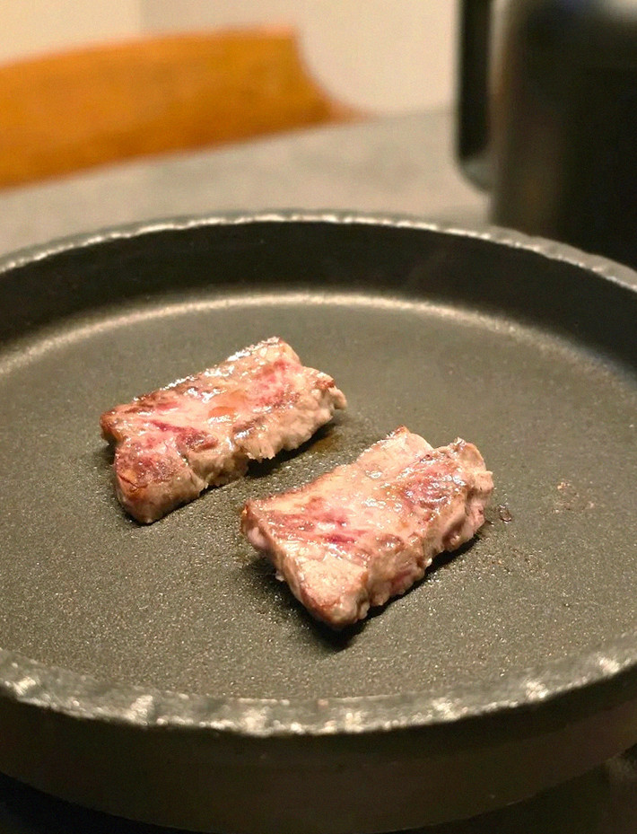 GOWOOGA Yeouido · premium marbled Hanwoo beef presented before grilling