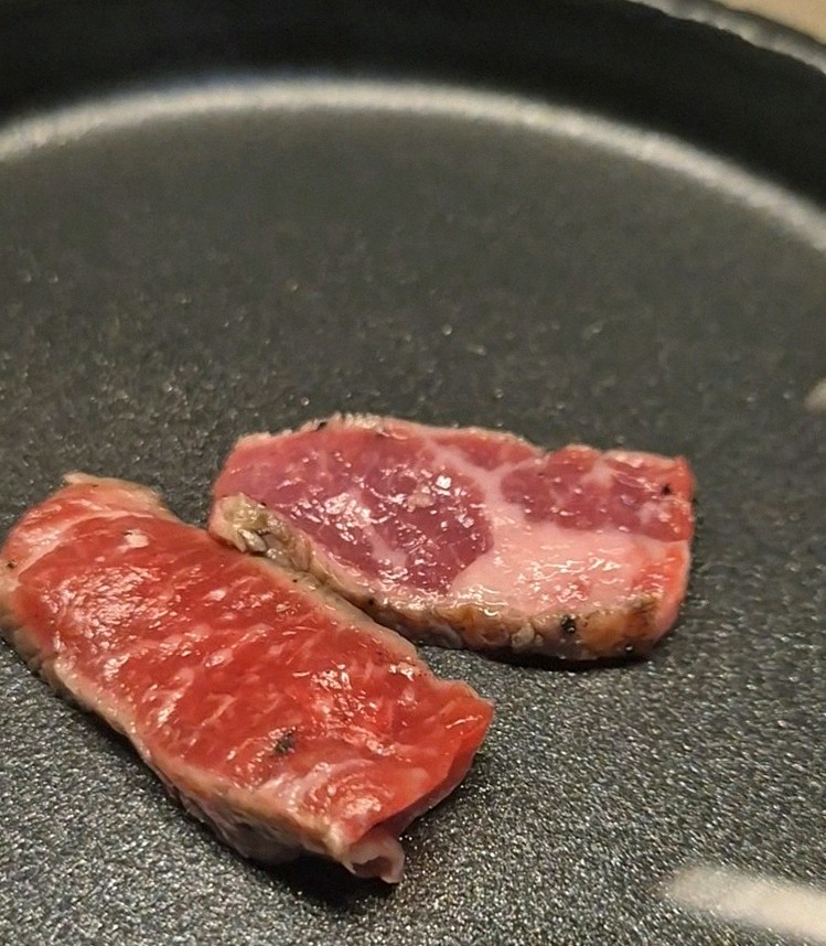 WOOARA Yeouido · premium marbled Hanwoo beef presented before grilling