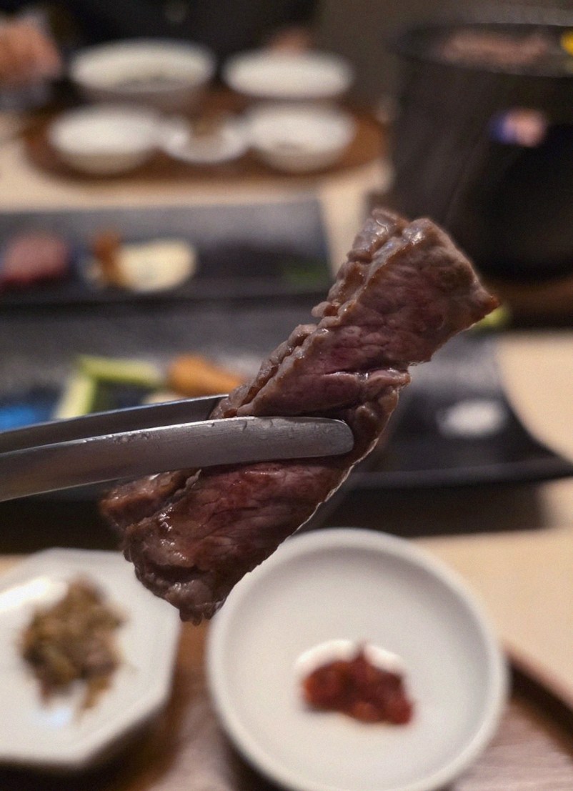 WOOARA Yeouido · premium marbled Hanwoo beef presented before grilling