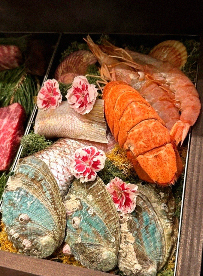 WOOHANA Yeouido · seafood course served alongside the beef