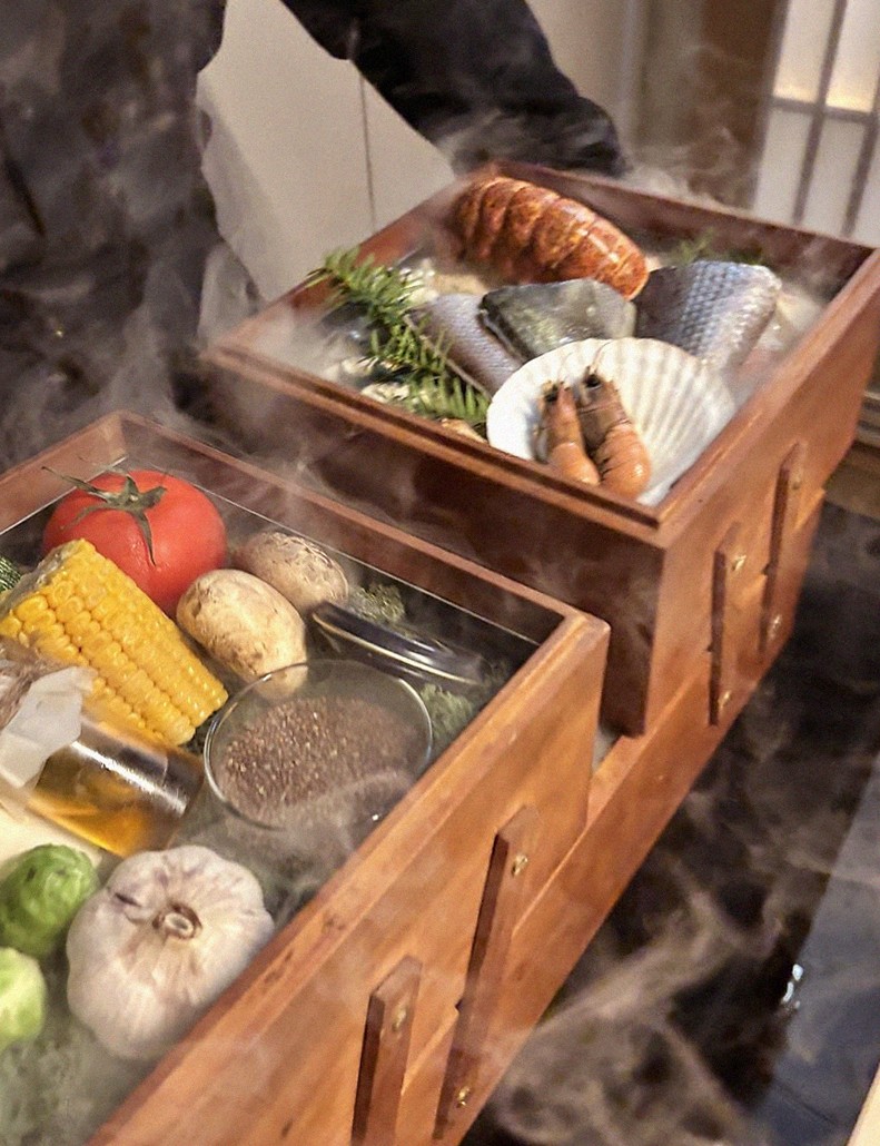 WOOARA Gwanghwamun · the signature Hanwoo showing — marbled beef cuts and caviar presented in a display chest