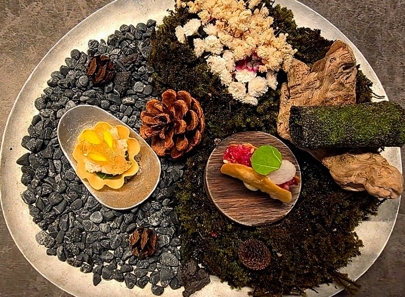 GOWOOGA Yeouido · the signature Hanwoo showing — marbled beef cuts and caviar presented in a display chest