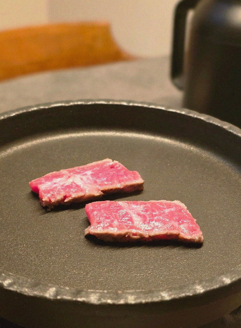 GOWOOGA Yeouido · premium marbled Hanwoo beef presented before grilling