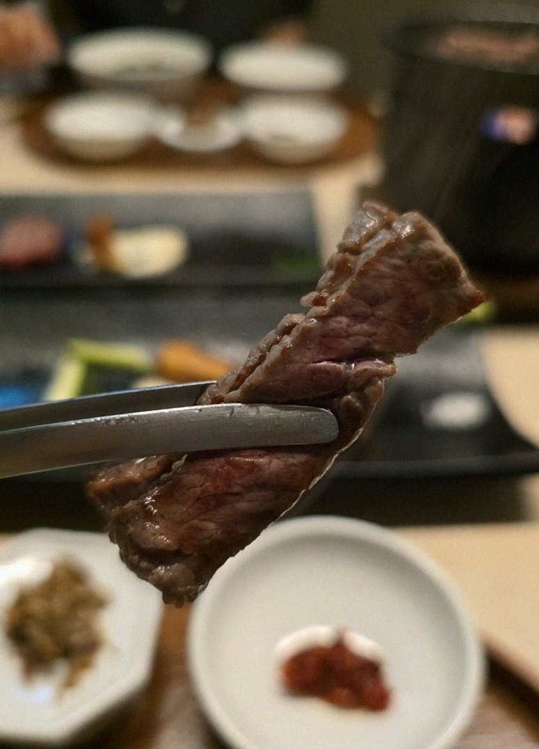 WOOARA Yeouido · premium marbled Hanwoo beef presented before grilling