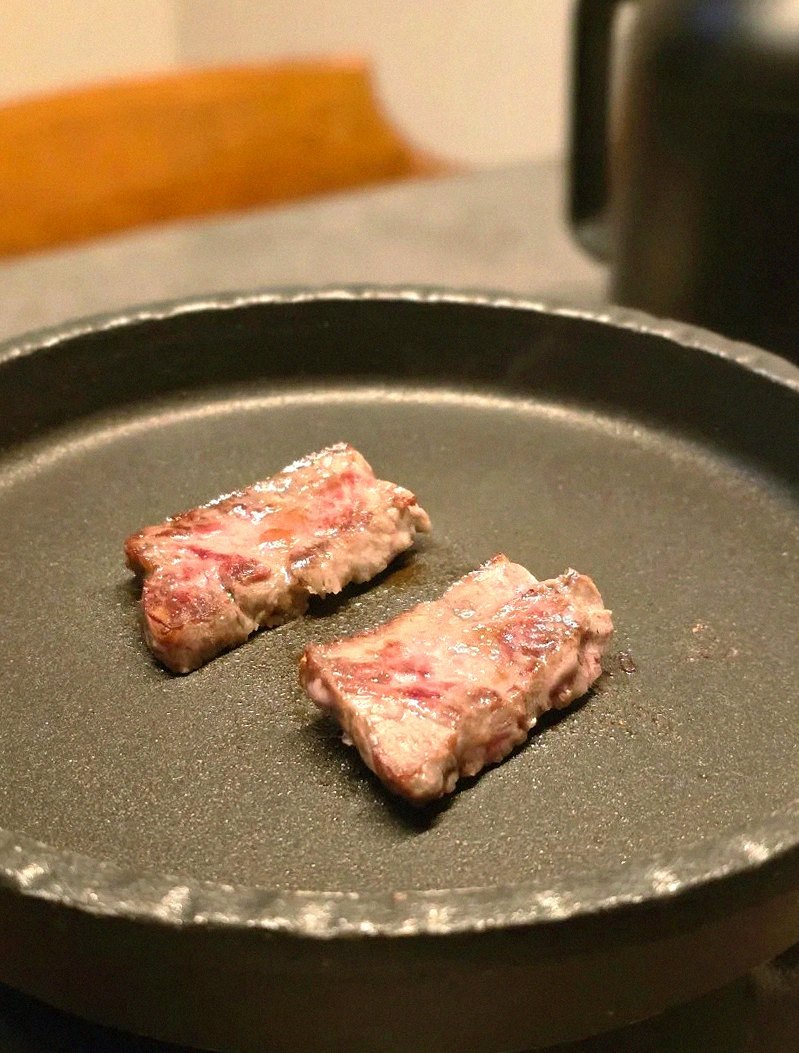 GOWOOGA Yeouido · premium marbled Hanwoo beef presented before grilling
