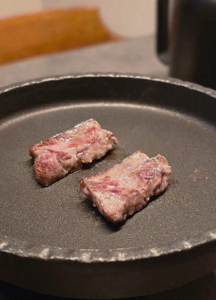 GOWOOGA Yeouido · premium marbled Hanwoo beef presented before grilling