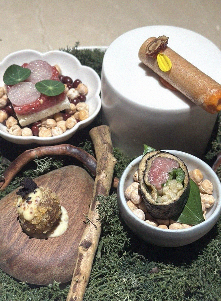 WOOARA Yeouido · the signature Hanwoo showing — marbled beef cuts and caviar presented in a display chest