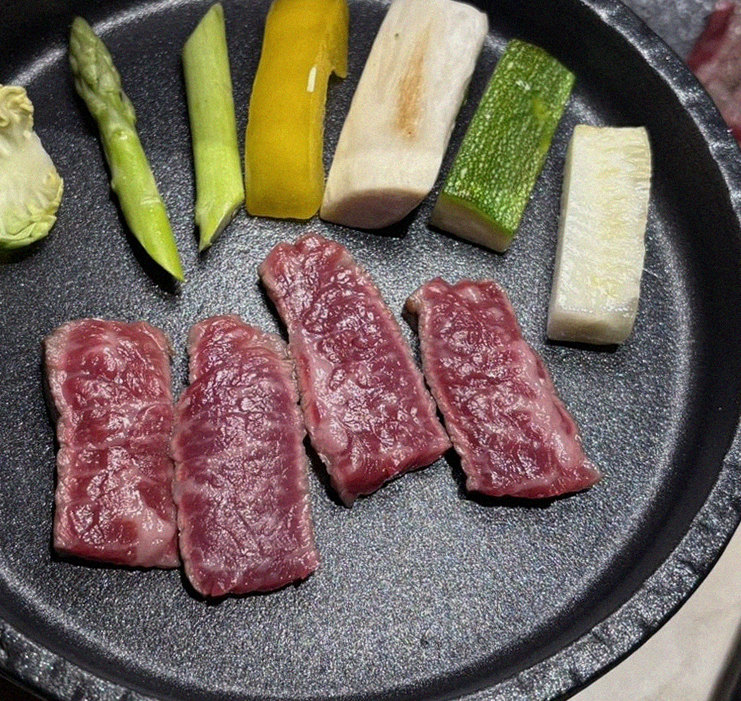 WOOARA Yeouido · premium marbled Hanwoo beef presented before grilling