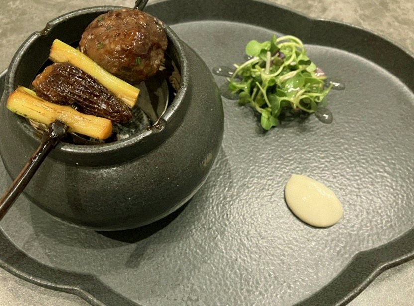 GOWOOGA Gwanghwamun · a plated course of Hanwoo beef