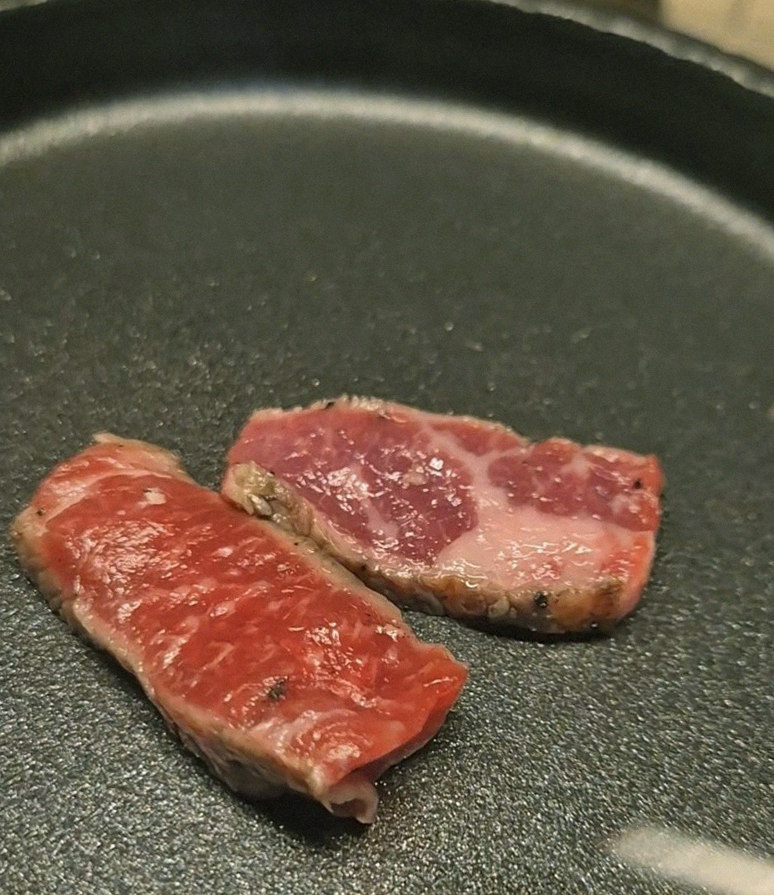 WOOARA Gwanghwamun · premium marbled Hanwoo beef presented before grilling