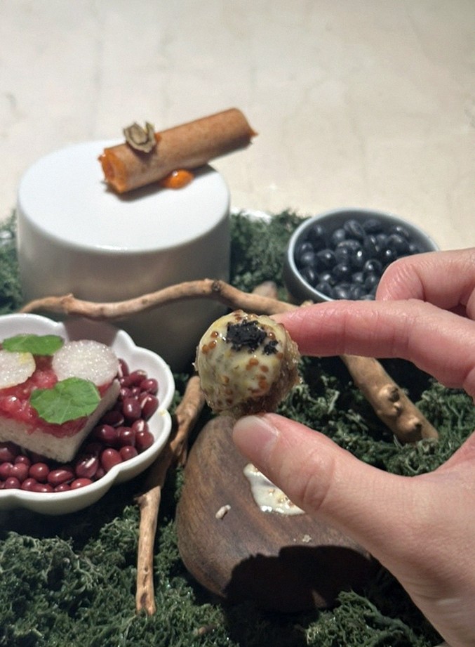 WOOARA Gwanghwamun · the signature Hanwoo showing — marbled beef cuts and caviar presented in a display chest