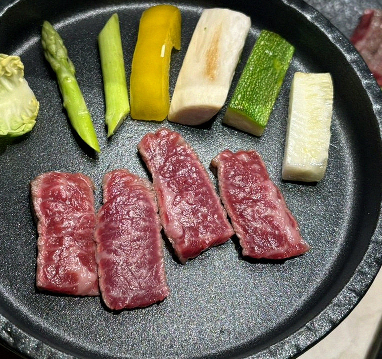 WOOARA Yeouido · premium marbled Hanwoo beef presented before grilling