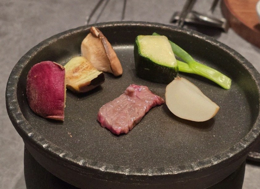 WOOHANA Jonggak · Hanwoo beef grilling over binchotan charcoal