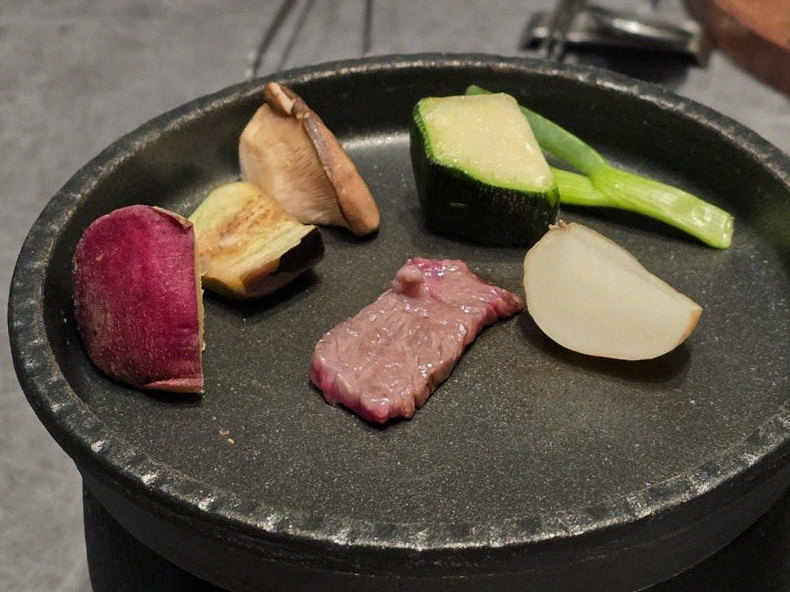 WOOHANA Jonggak · Hanwoo beef grilling over binchotan charcoal
