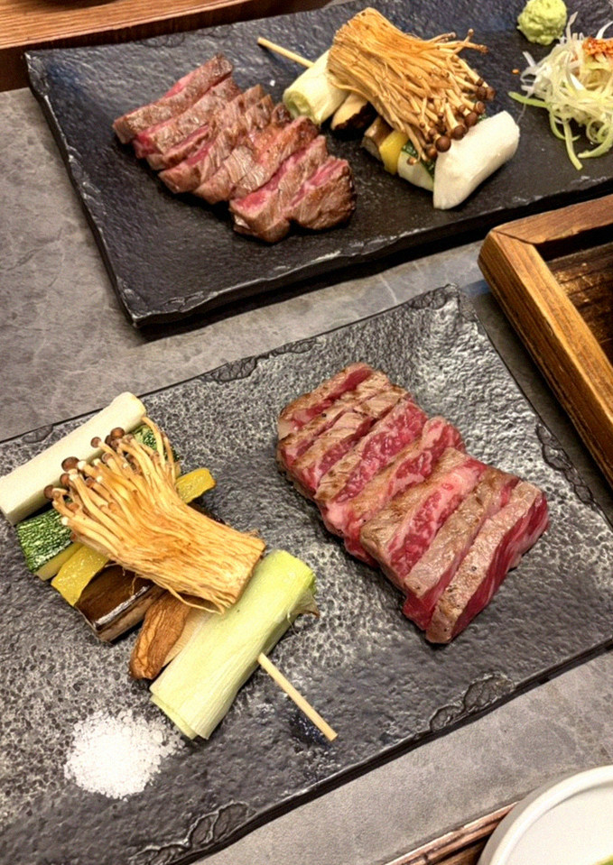 GOWOOGA Yeouido · premium marbled Hanwoo beef presented before grilling