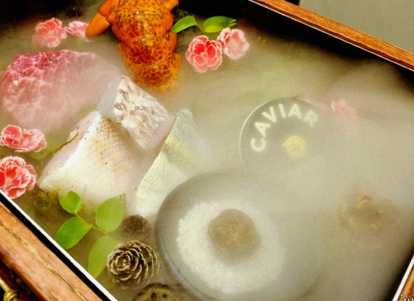 GOWOOGA Yeouido · the signature Hanwoo showing — marbled beef cuts and caviar presented in a display chest