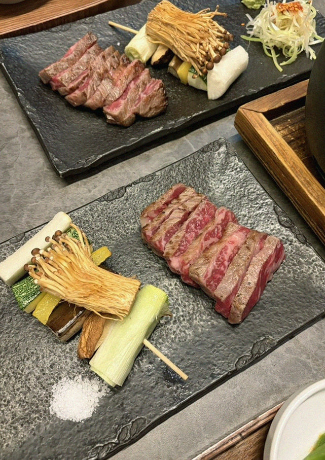 GOWOOGA Yeouido · premium marbled Hanwoo beef presented before grilling