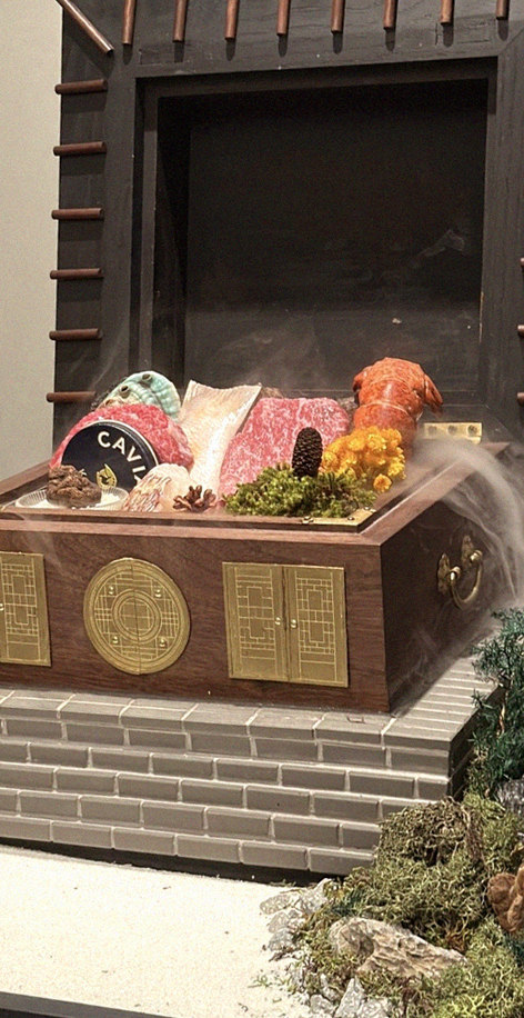 GOWOOGA Gangnam·Yeoksam · the signature Hanwoo showing — marbled beef cuts and caviar presented in a display chest