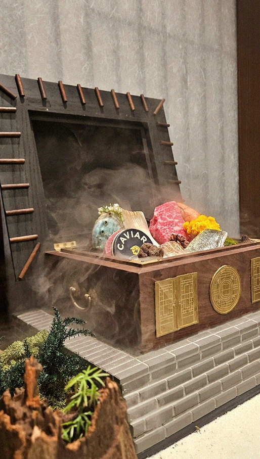 GOWOOGA Gangnam·Yeoksam · the signature Hanwoo showing — marbled beef cuts and caviar presented in a display chest