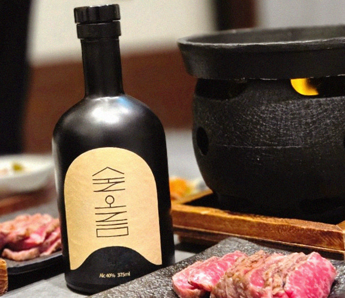 GOWOOGA Gangnam·Yeoksam · the signature Hanwoo showing — marbled beef cuts and caviar presented in a display chest