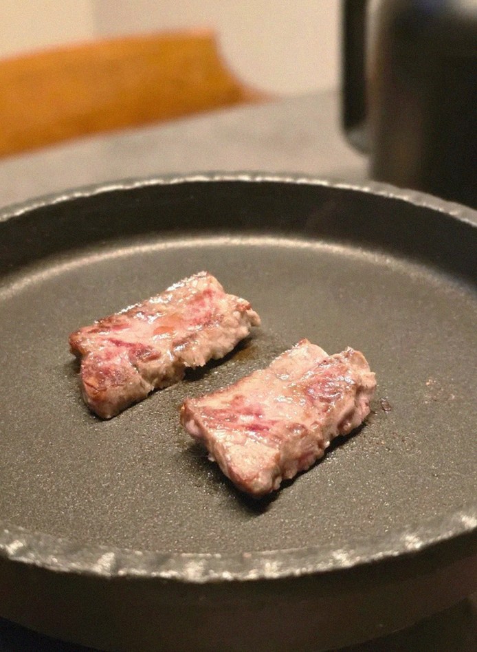 GOWOOGA Yeouido · premium marbled Hanwoo beef presented before grilling