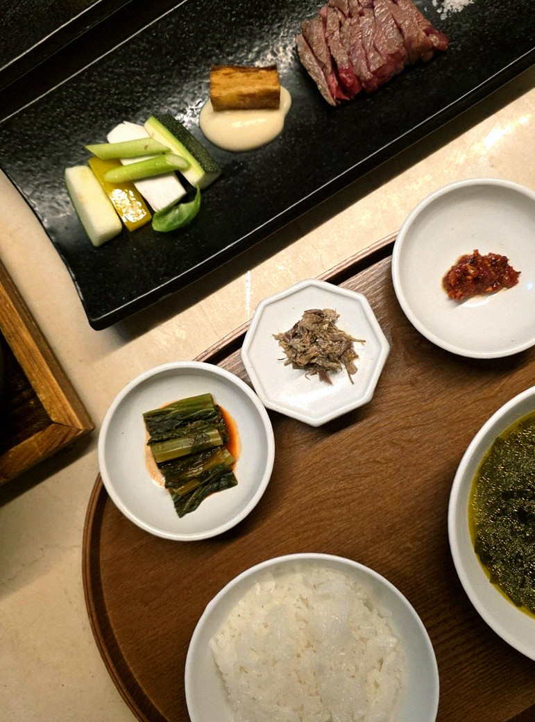 WOOARA Gwanghwamun · assorted Korean side dishes (banchan)