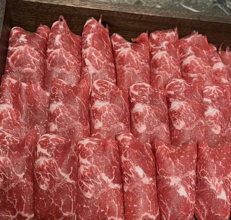 DAEBOJUNG City Hall · premium marbled Hanwoo beef presented before grilling