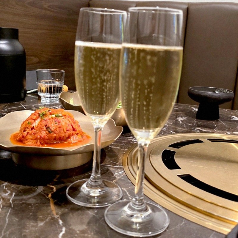 DAEBOJUNG City Hall · the signature Hanwoo showing — marbled beef cuts and caviar presented in a display chest