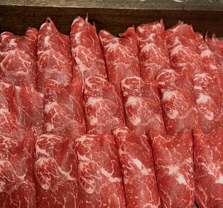 DAEBOJUNG Yeouido · premium marbled Hanwoo beef presented before grilling