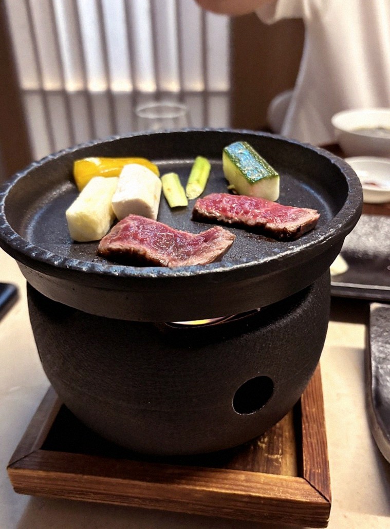 WOOARA Gwanghwamun · the signature Hanwoo showing — marbled beef cuts and caviar presented in a display chest