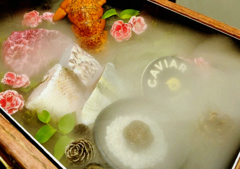 GOWOOGA Yeouido · the signature Hanwoo showing — marbled beef cuts and caviar presented in a display chest