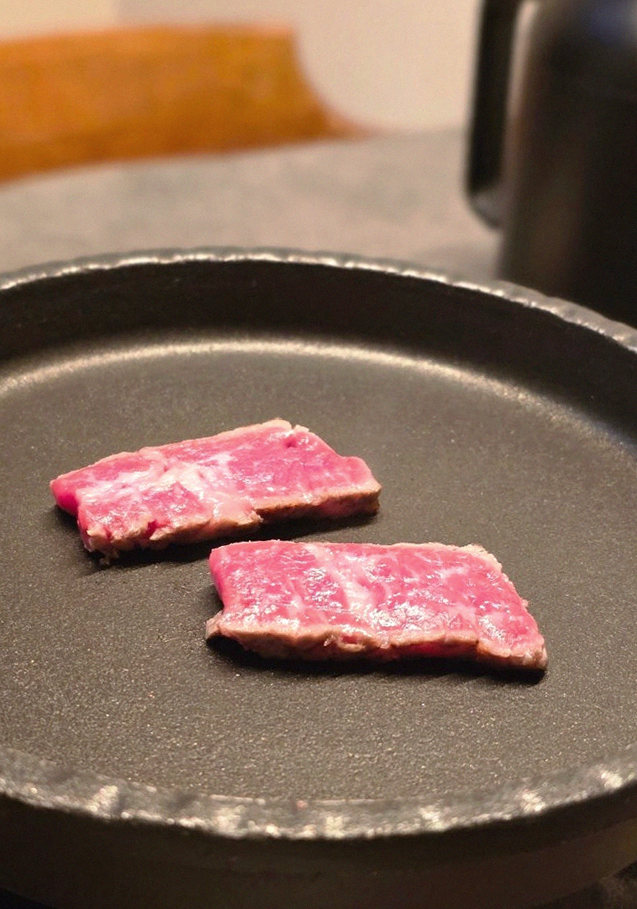 GOWOOGA Yeouido · premium marbled Hanwoo beef presented before grilling