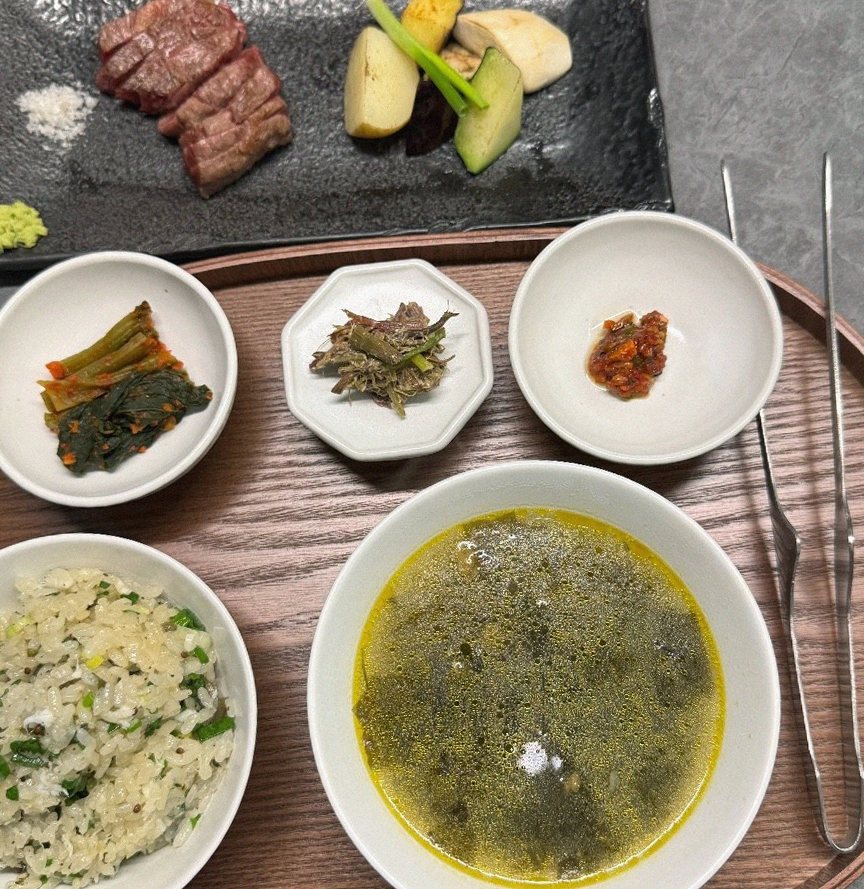 WOOHANA Jonggak · assorted Korean side dishes (banchan)