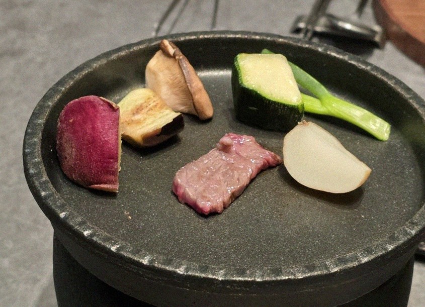 WOOHANA Jonggak · Hanwoo beef grilling over binchotan charcoal