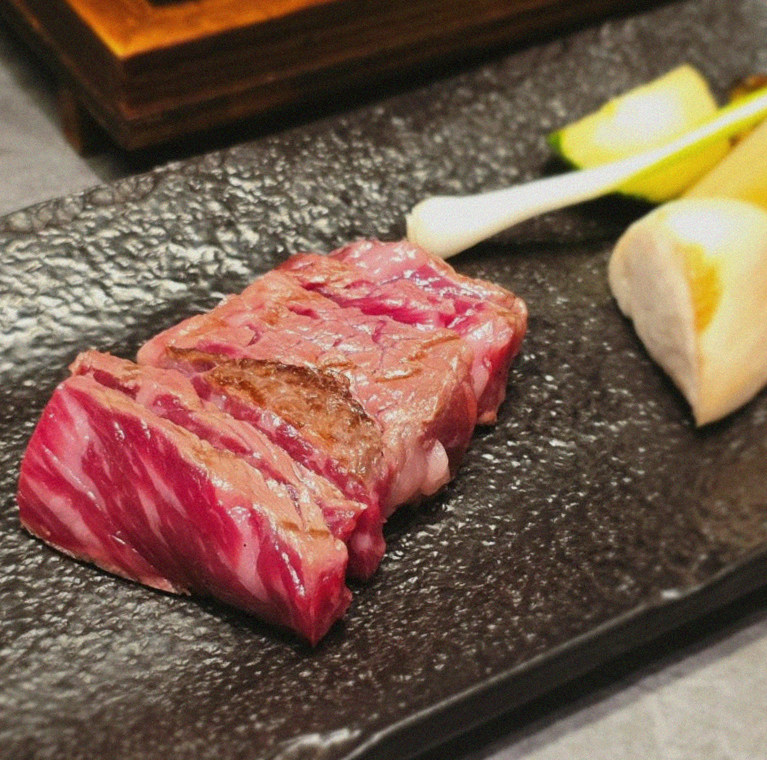 WOOHANA Jonggak · premium marbled Hanwoo beef presented before grilling