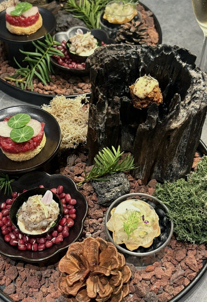 WOOHANA Jonggak · the signature Hanwoo showing — marbled beef cuts and caviar presented in a display chest