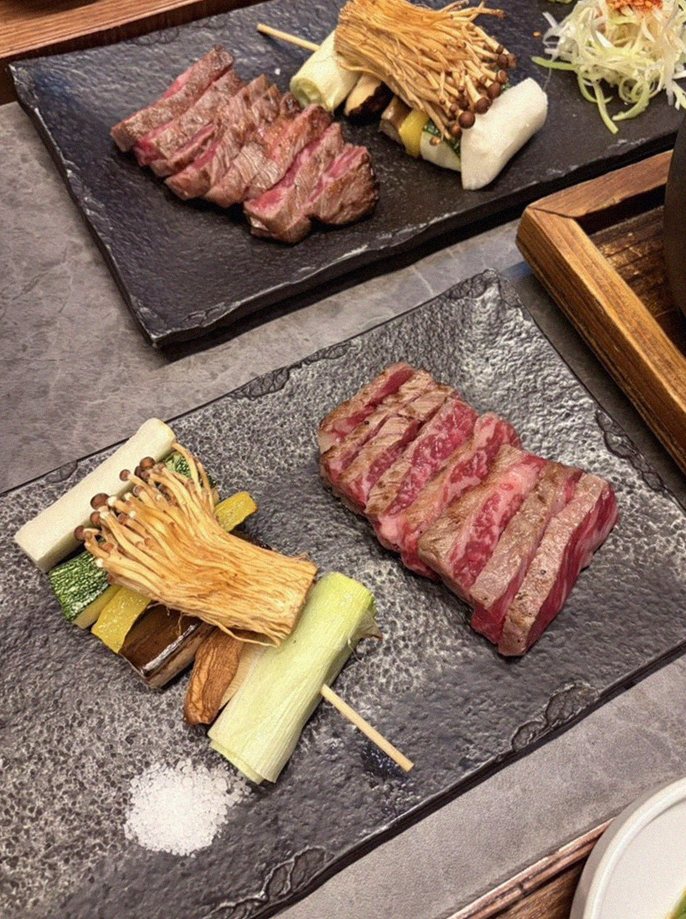 GOWOOGA Yeouido · premium marbled Hanwoo beef presented before grilling
