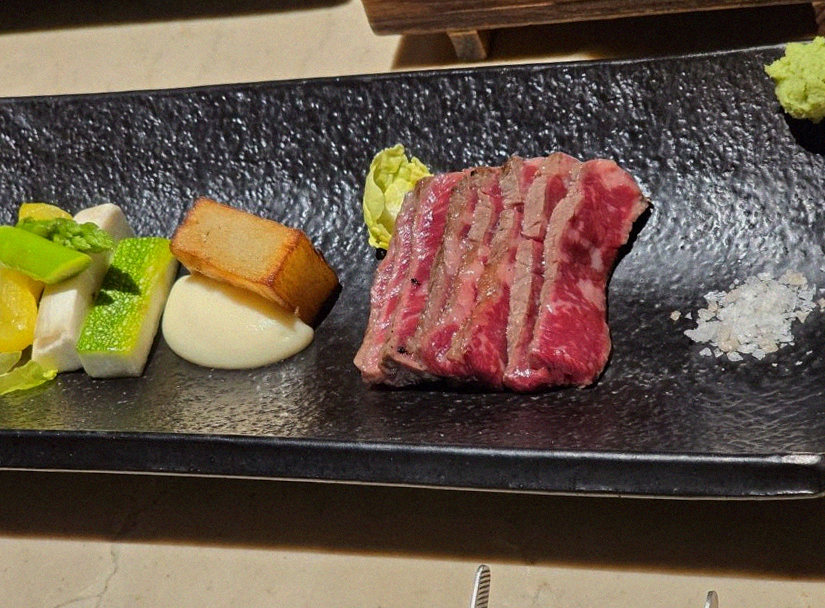 WOOARA Gwanghwamun · the signature Hanwoo showing — marbled beef cuts and caviar presented in a display chest