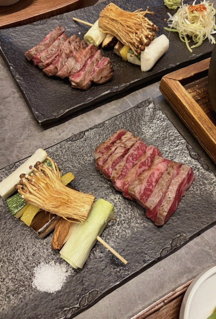 GOWOOGA Yeouido · premium marbled Hanwoo beef presented before grilling