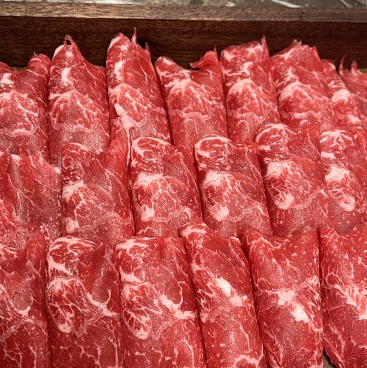 DAEBOJUNG City Hall · premium marbled Hanwoo beef presented before grilling