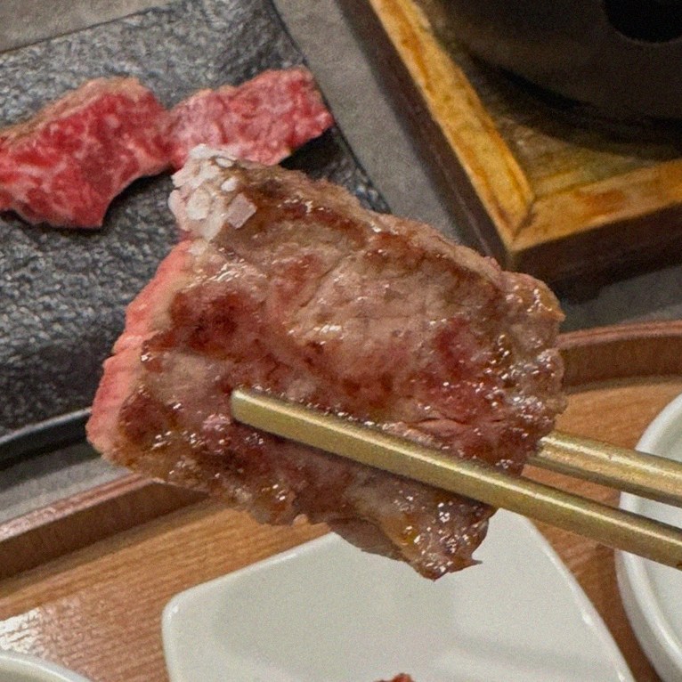GOWOOGA Gwanghwamun · premium marbled Hanwoo beef presented before grilling