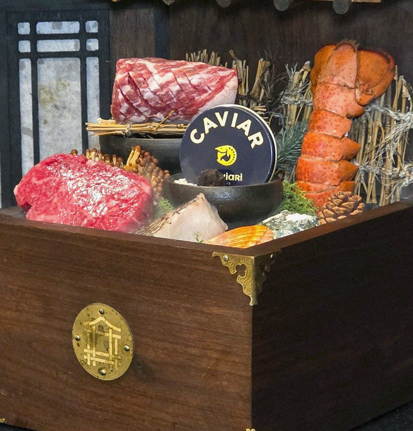 DAEBOJUNG Yeouido · the signature Hanwoo showing — marbled beef cuts and caviar presented in a display chest