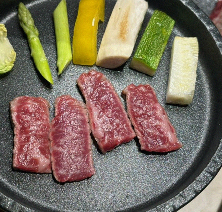 WOOARA Yeouido · premium marbled Hanwoo beef presented before grilling