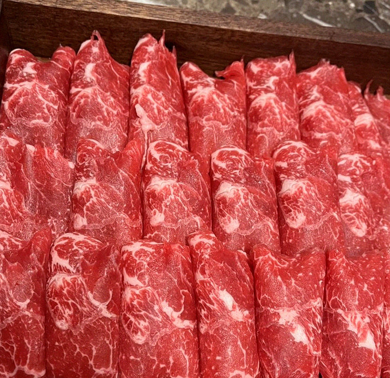 DAEBOJUNG City Hall · premium marbled Hanwoo beef presented before grilling