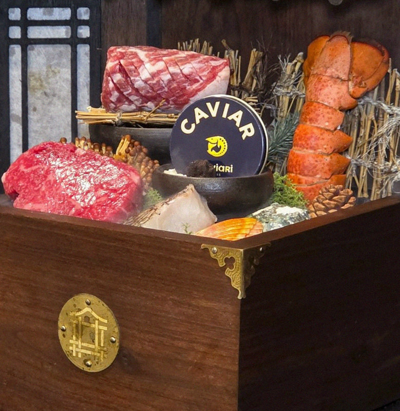 DAEBOJUNG City Hall · the signature Hanwoo showing — marbled beef cuts and caviar presented in a display chest
